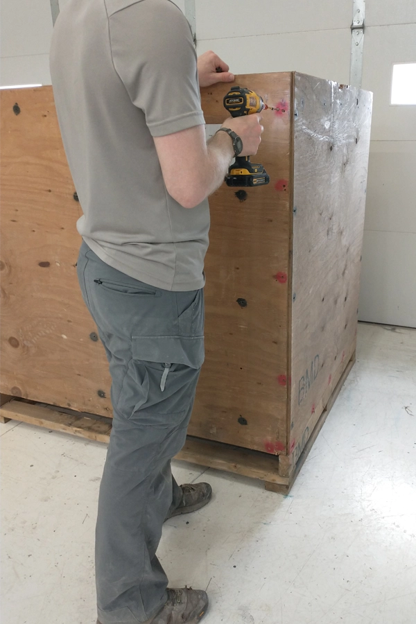 wood crate being constructed for shipping