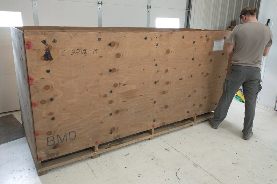 wood crate being constructed for shipping